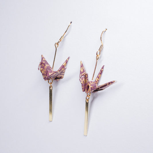 Pair of handmade purple origami crane earrings with gold bar and hooks, crafted from traditional Japanese washi paper