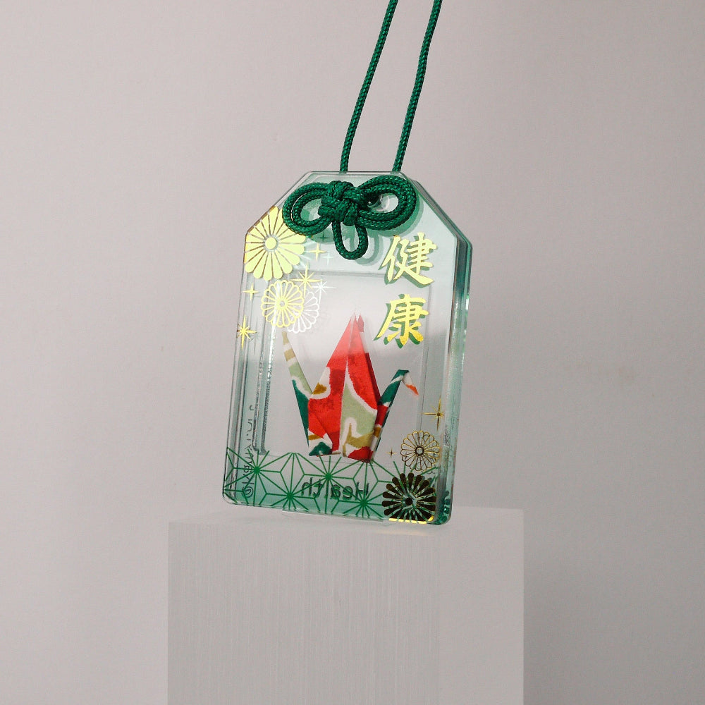 Decorative hanging tag with Chinese characters on a white background
